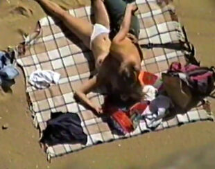 Candid beach hook-up and naturist vid shot over the some