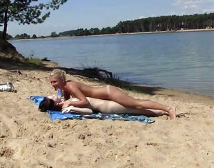 2 warm russian teenage getting a sunburn on the free beach.