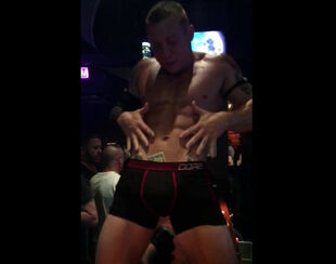 Tatted masculine stripper in homosexual club