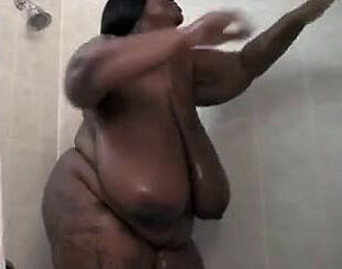 This Gigantic ebony doll jerks in the shower. Her hefty